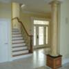 View of Stairway to Balcony & Entrance Door from Family Room